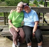 Volunteer Silvia Mauerhofer (in blue T-shirt) with volunteer Deb Youd, wife of the Rev. Steve Youd, retired pastor of First Baptist Church of Hanson.