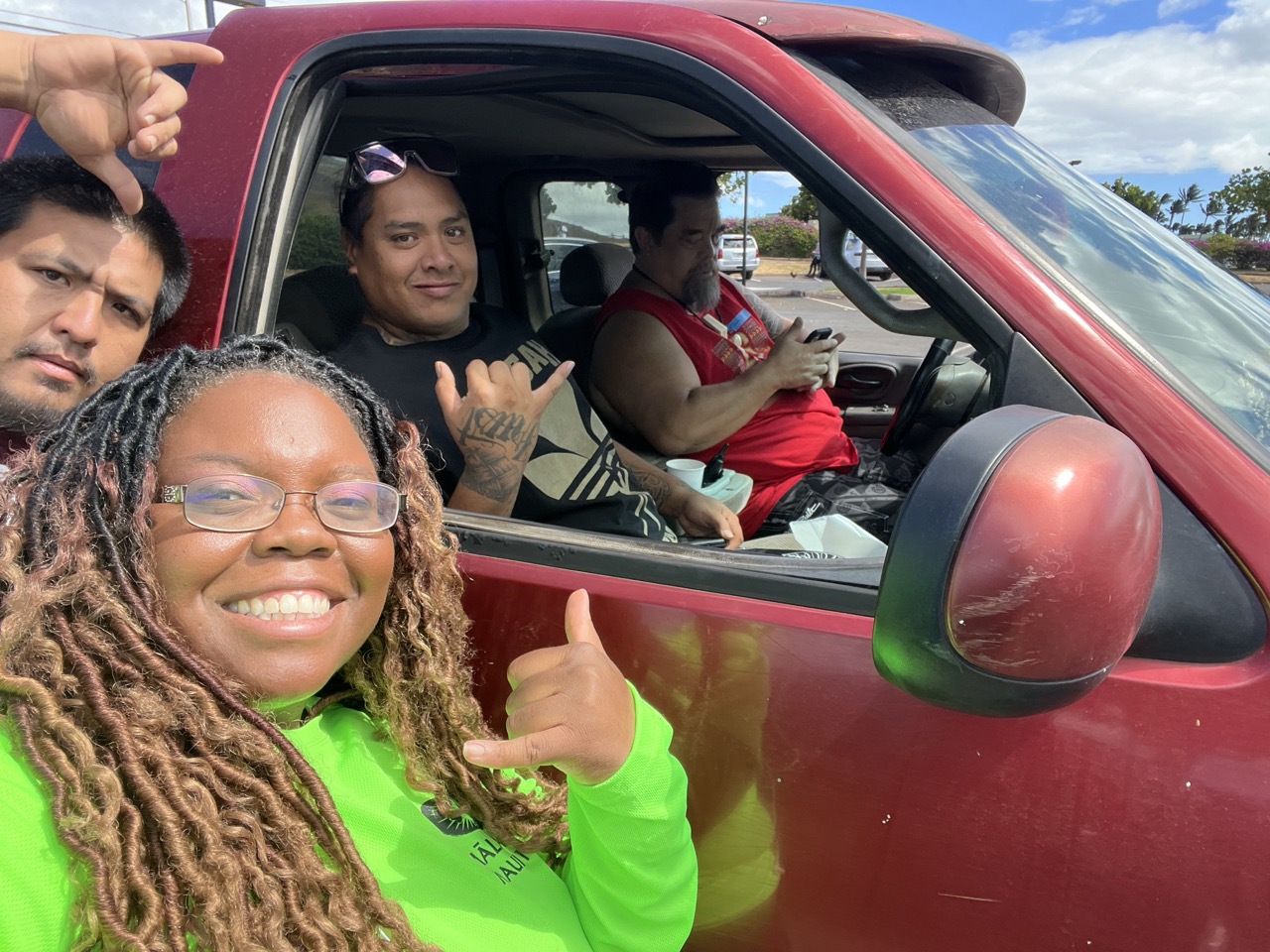 Photo of attorney Leslee Matthews, lower left, who appears with volunteers from The Living Way Church prior to embarking of clean-up efforts following the devastating wildfire on the Island of Maui, Hawaii.