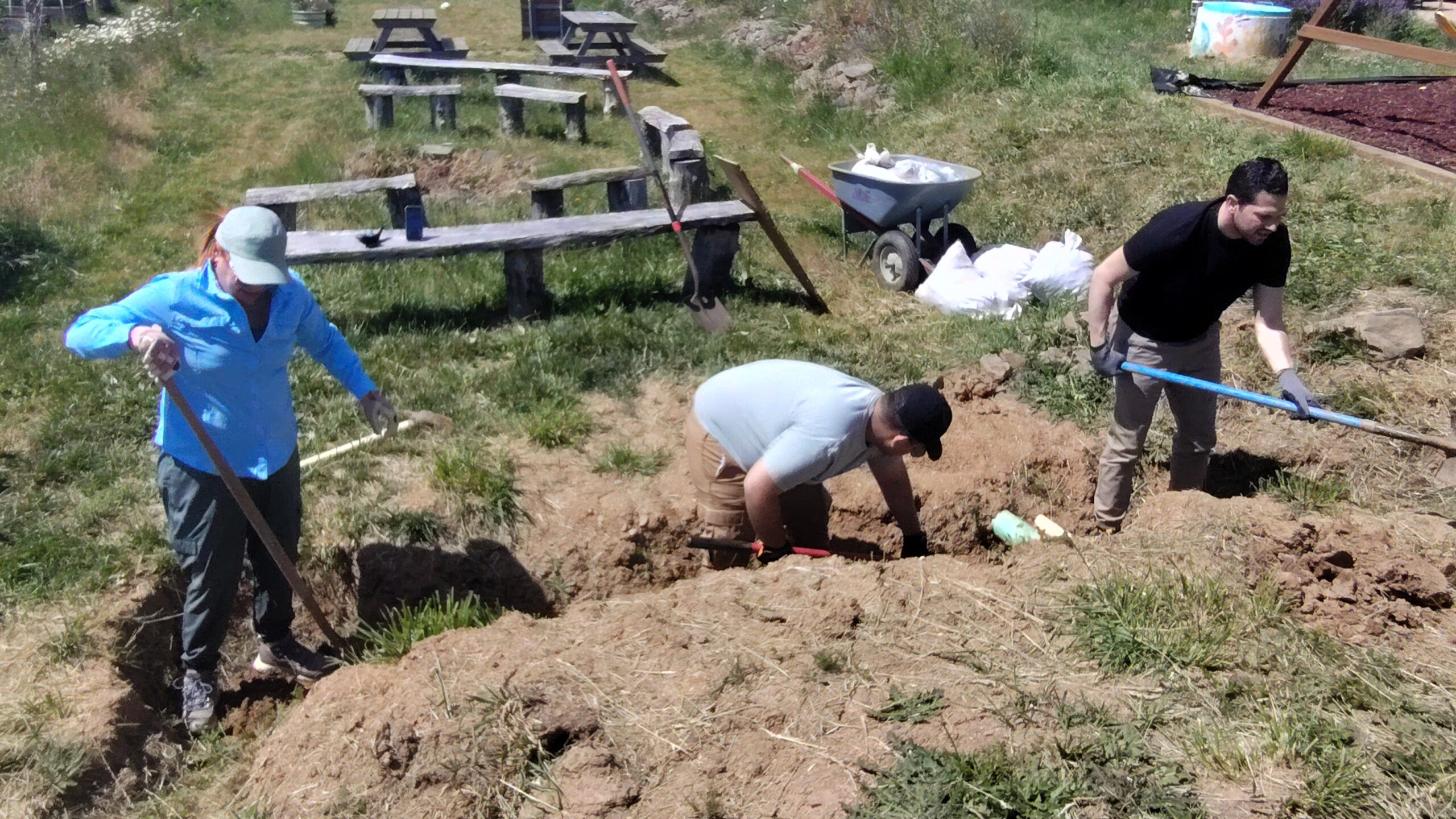 Photo of Building Bridges cohort members constructing sensory pond in Puerto Rico